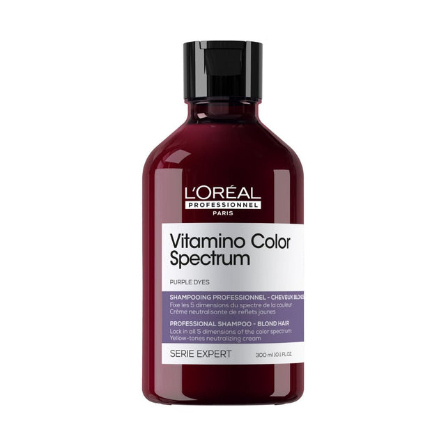 A bottle of L'Oreal Professionnel Vitamino Color Spectrum Purple Shampoo 300ml, designed for blonde hair to neutralize yellow undertones.